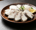 Delicate Seafood Delight: Freshly Sliced Fish Fillets